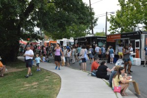Food Trucks line-up on the road bordering Central Park and the Farmers Market